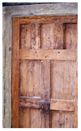 a lovely, historic wooden door from Mission San Jose in San Antoni