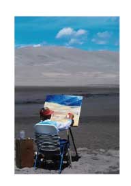 person paintng a landscape