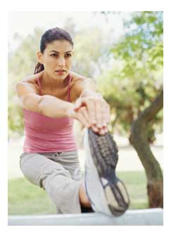 woman stretching after a run