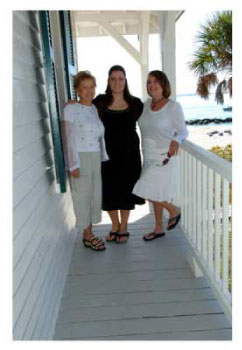 3 generations of women on the porch during a vacation