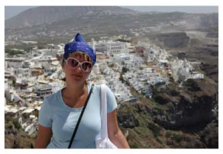 a woman tourist on a mountainto